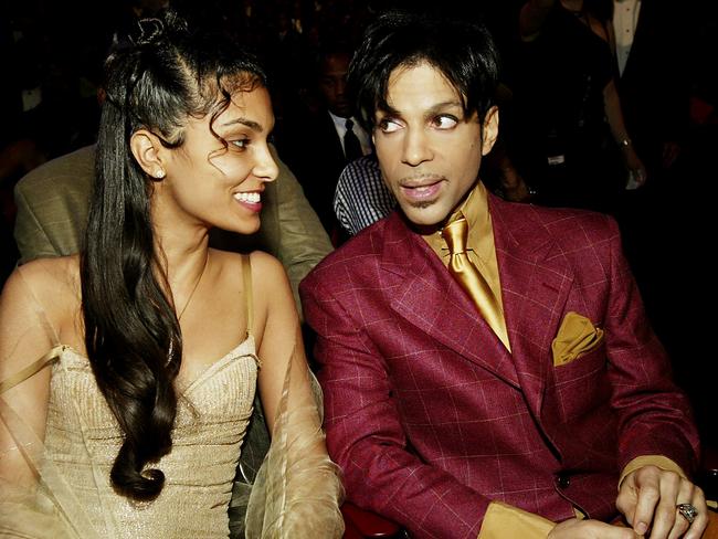 Prince and his wife Manuela Testolini sit in the audience at the 35th Annual NAACP Image Awards in 2004.