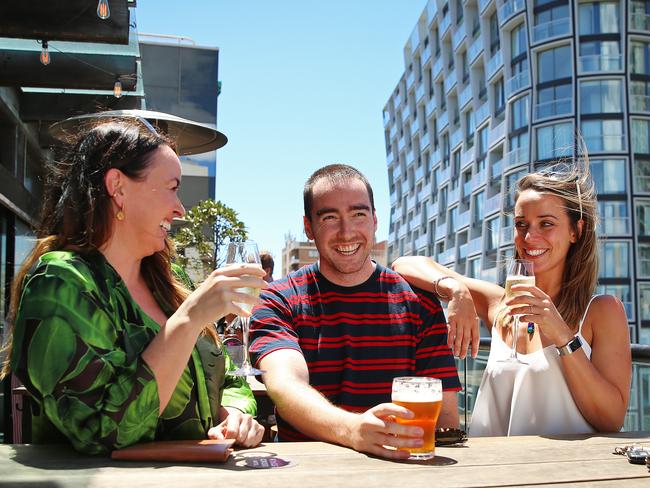 Belinda Humphreys, Andrew Anderson and Steph Hibbert enjoying a drink on the Kings Cross Hotel’s roof top terrace, which is in danger of being shut because of noise complaints. Picture: Sam Ruttyn