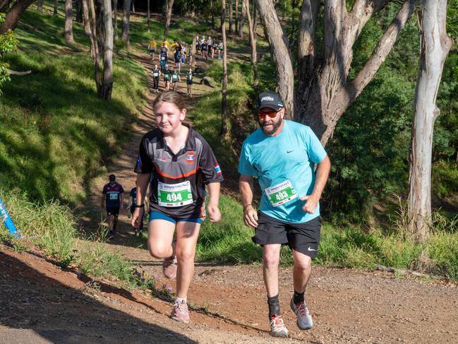 With a sprint to the end of the 5km hike, Mia and her father Bill Daniell.Hike for Homeless held at Jubilee Park. October 19th, 2024