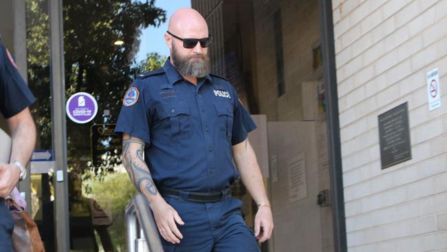 Constable James Kirstenfeldt leaves the Alice Springs Local Court in 2022 after giving evidence at an inquest into the death of Kumanjayi Walker. Picture: Jason Walls