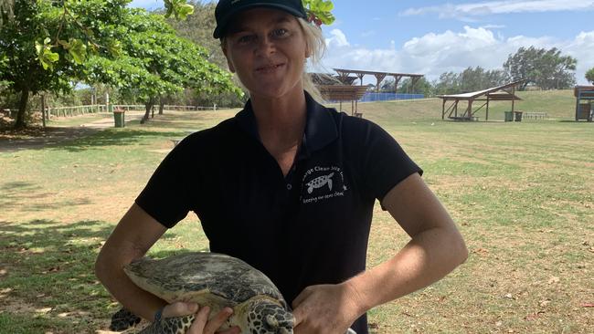 Eco Barge Clean Seas founding chair Libby Edge holding Donatella the turtle. Picture: Melanie Whiting