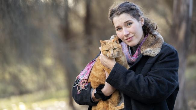 PhD candidate and environmental consultant Alex Paton with her cat Megatron at Honeywood. Picture: Chris Kidd