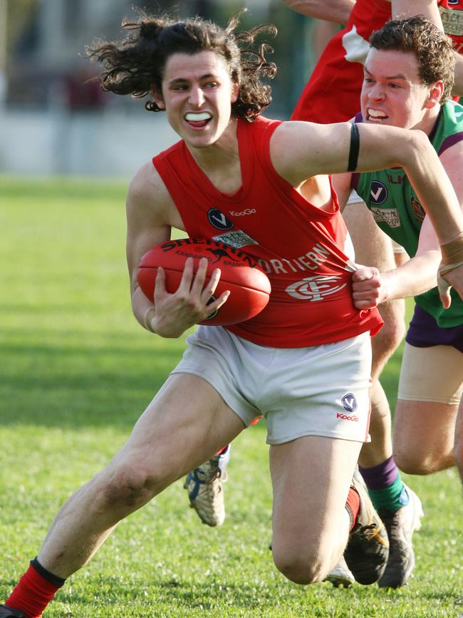 Damon Marcon evades a tackle during his time with Preston Bullants. Picture: Mark Wilson