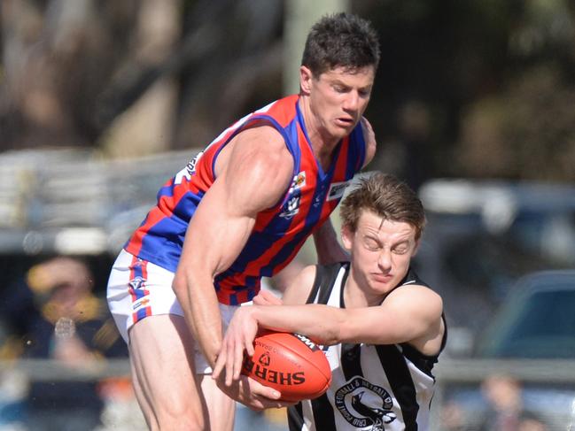 Rye ruckman Rhett Sutton battles with Crib Point midfielder Jake Bromley. Picture: Chris Eastman