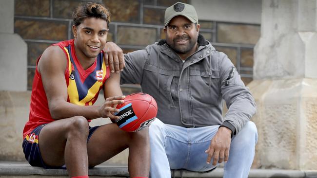 New Melbourne recruit Kysaiah Pickett with his uncle Byron Pickett, who won the 2004 Norm Smith Medal for Port Adelaide. Picture: AAP Image/Dean Martin