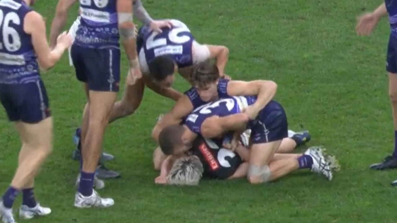 Fremantle's Sam Switkowski has been referred to the Tribunal for this chicken wing on Collingwood's Jack Ginnivan.