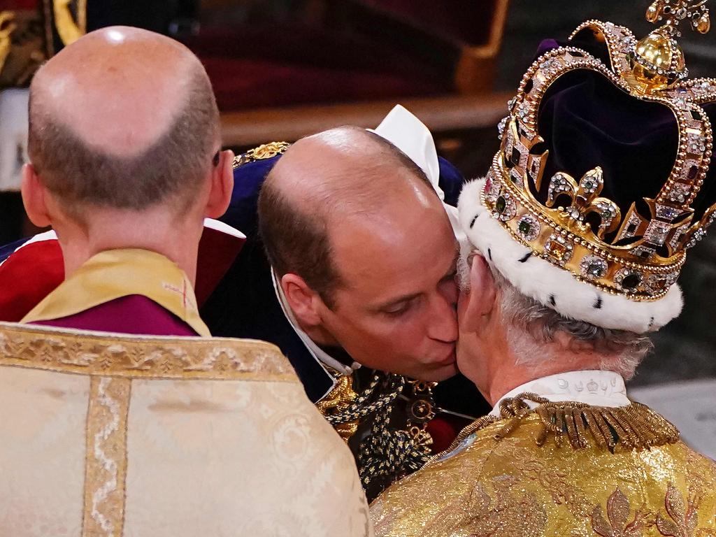 Prince William, Prince of Wales kisses his father, Britain's King Charles III. Picture: Yui Mok/AFP