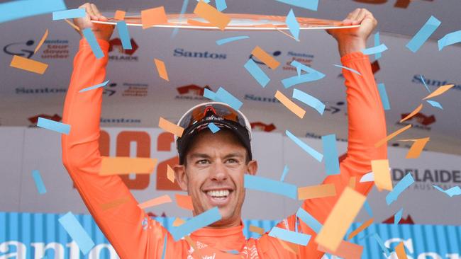 Australian rider Richie Porte from team Trek-Segafredo reacts on the podium after winning the Tour Down Under UCI World Tour cycling event in Adelaide on January 26, 2020. (Photo by Brenton EDWARDS / AFP) / -- IMAGE RESTRICTED TO EDITORIAL USE - STRICTLY NO COMMERCIAL USE --