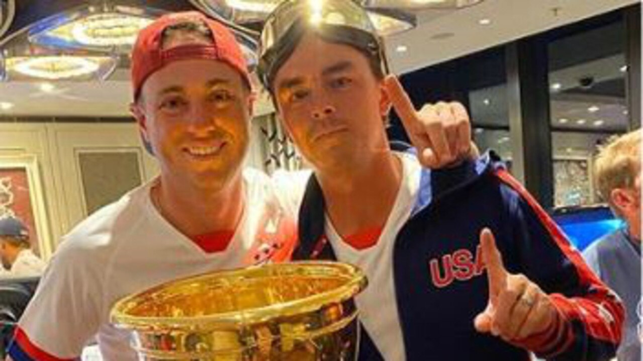 Justin Thomas and Rickie Fowler with the cup. Hard to tell which side they were on.