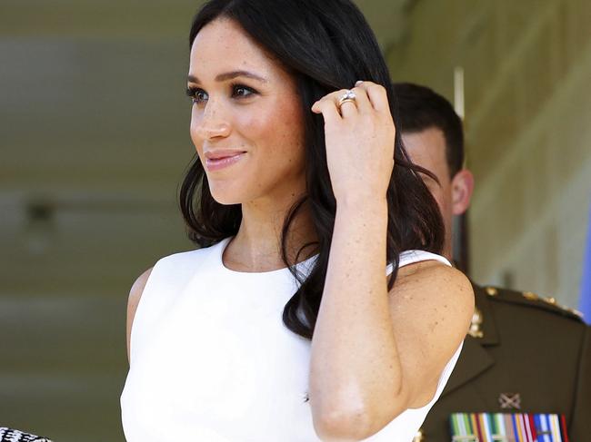 Britain's Duchess of Sussex arrives at Admiralty House in Sydney, Australia, Tuesday, Oct. 16, 2018. Britain's Prince Harry and his wife Meghan are on a 16-day tour of Australia and the South Pacific.(Phil Noble/Pool via AP)