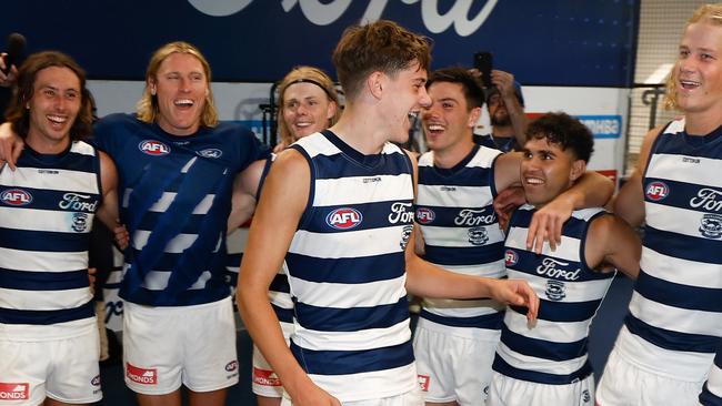 GEELONG, AUSTRALIA - APRIL 14: Debutant, Connor O'Sullivan of the Cats sings the team song during the 2024 AFL Round 05 match between the Geelong Cats and the North Melbourne Kangaroos at GMHBA Stadium on April 14, 2024 in Geelong, Australia. (Photo by Michael Willson/AFL Photos via Getty Images)