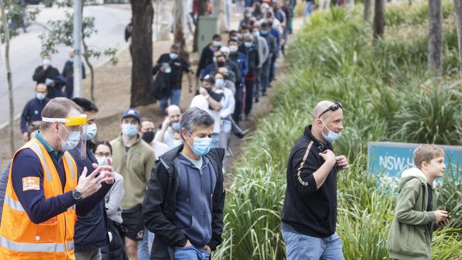 Long queues of people are seen at the NSW Vaccination Centre in Homebush. Picture: Getty Images