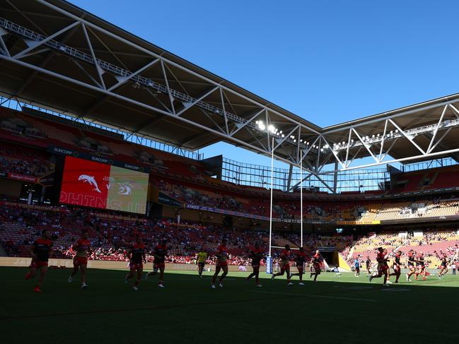 BRISBANE, AUSTRALIA - MARCH 05: Dolphins warms up ahead of the round one NRL match between the Dolphins and Sydney Roosters at Suncorp Stadium on March 05, 2023 in Brisbane, Australia. (Photo by Chris Hyde/Getty Images)