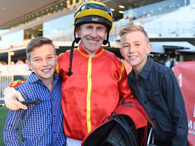 Sons Zac (left) and Jaden (right) with Jeff Lloyd after he won the last race on Sagaronne at Doomben - Photo Natasha Wood, Trackside Photography