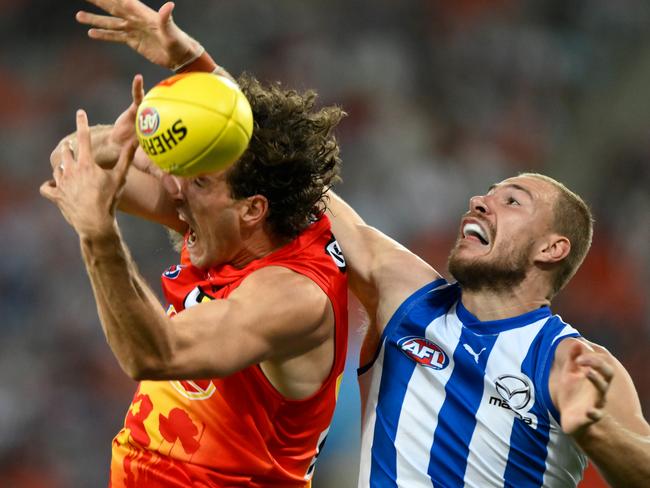 GOLD COAST, AUSTRALIA - APRIL 23: Ben McKay of the Kangaroos competes for the ball against Ben King of the Suns during the round six AFL match between Gold Coast Suns and North Melbourne Kangaroos at Heritage Bank Stadium, on April 23, 2023, in Gold Coast, Australia. (Photo by Matt Roberts/AFL Photos/via Getty Images)