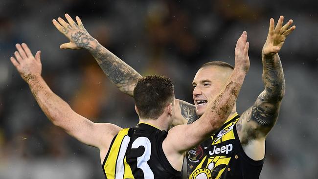 Jack Higgins and Dustin Martin celebrate a goal during Richmond’s win. Picture: Quinn Rooney/Getty Images.