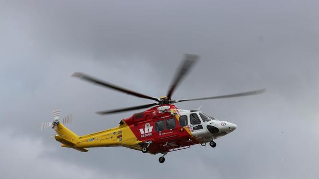 Newcastle Storm: Westpac Rescue Helicopter conducting transfer to John Hunter Hospital on March 28 in rocky conditions.