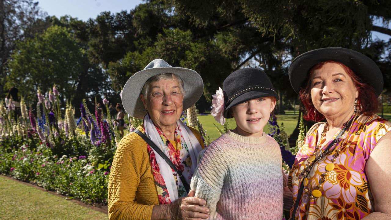 Three generations (from left) Judy Dalglish, Tova Howard and Karen Dalglish in Queens Park for Carnival of Flowers, Saturday, September 21, 2024. Picture: Kevin Farmer