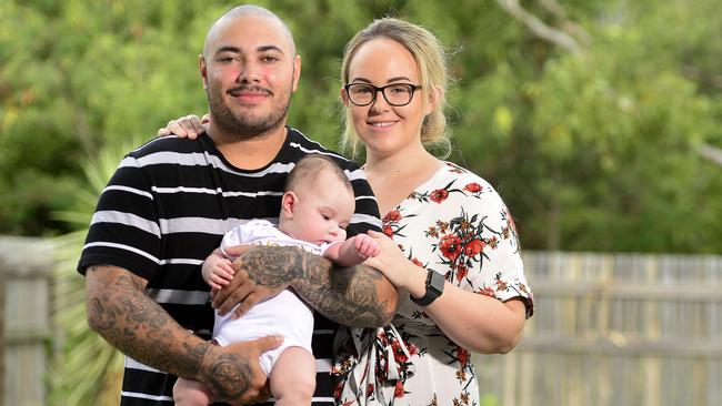 Baby Rylee, held by dad Logan Gardner, was having up to 150 seizures a day but has been seizure free for the last month after doctors changed her formula to Keto. Mum Amie Rootsey could not be happier. PICTURE: MATT TAYLOR.