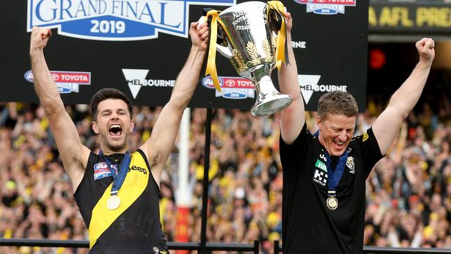 Captain Cotch and Damien Hardwick with the 2019 premiership. Picture: Michael Klein.