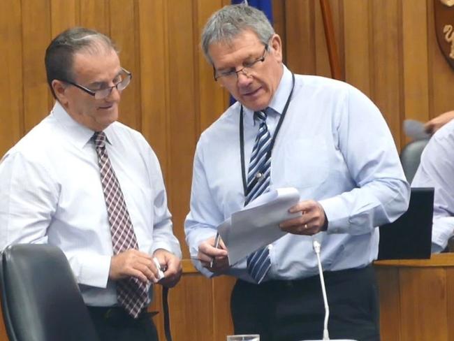 Clarence Valley Council mayor Jim Simmons and  director corporate Ashley Lindsay discuss the agenda before a council meeting.