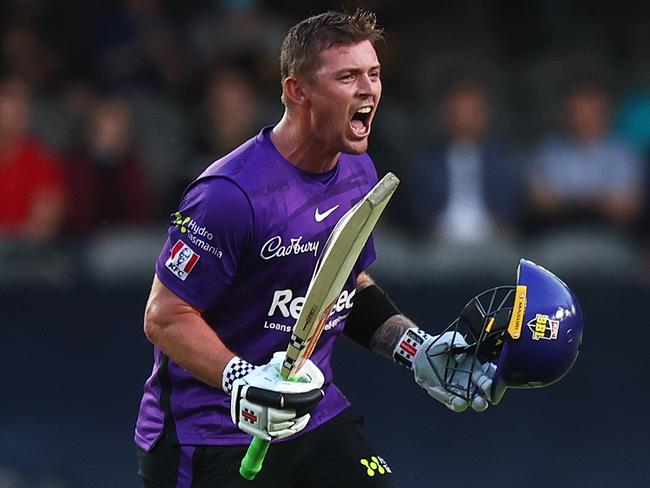 MELBOURNE, AUSTRALIA - DECEMBER 29: Ben McDermott of the Hurricanes celebrates after scoring a century during the Men's Big Bash League match between the Melbourne Renegades and the Hobart Hurricanes at Marvel Stadium, on December 29, 2021, in Melbourne, Australia. (Photo by Mike Owen/Getty Images)