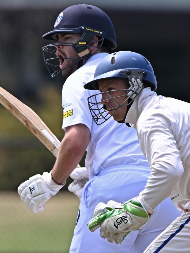 VSDCA: Hoppers Crossing batter Brett Smith and Williamstown keeper Brenton Hodges. Picture: Andy Brownbill