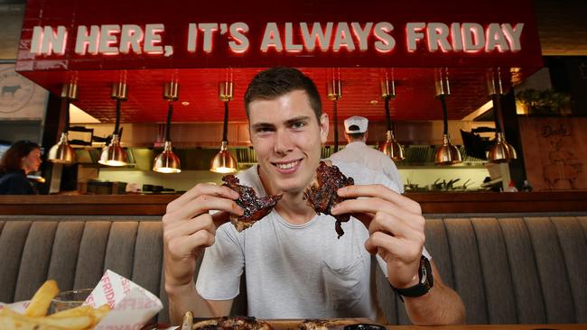 Collingwood player Mason Cox at TGI Friday’s at Chadstone in 2019. Picture Andrew Tauber