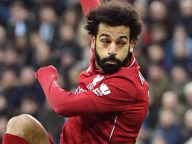 NEWCASTLE UPON TYNE, ENGLAND - MAY 04: Mohamed Salah of Liverpool scores his team's second goal during the Premier League match between Newcastle United and Liverpool FC at St. James Park on May 04, 2019 in Newcastle upon Tyne, United Kingdom. (Photo by Laurence Griffiths/Getty Images)