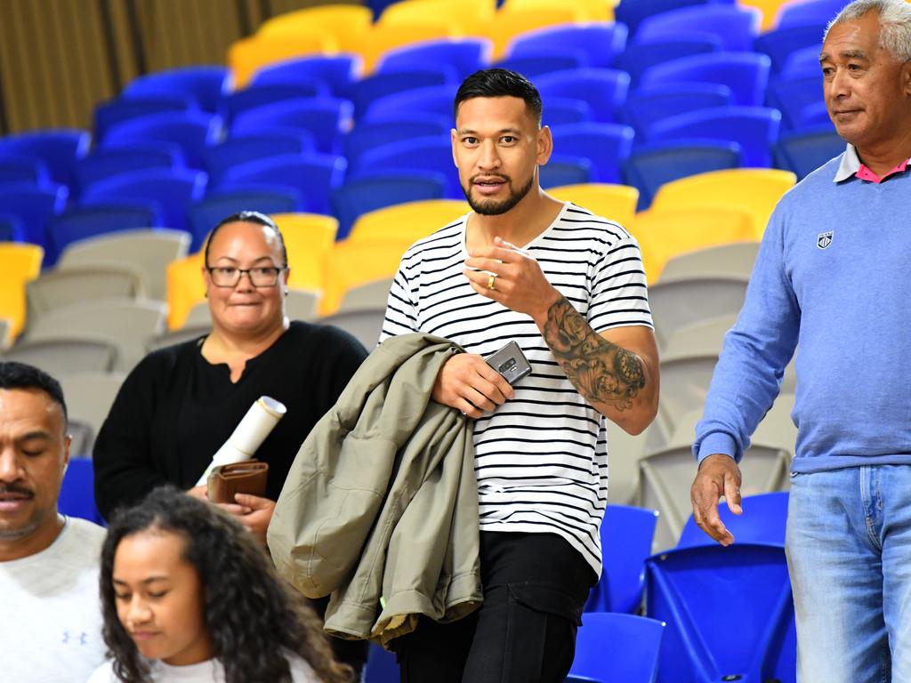 Israel Folau watches his wife’s netball game on the Sunshine Coast last weekend. (AAP Image/Dan Peled)