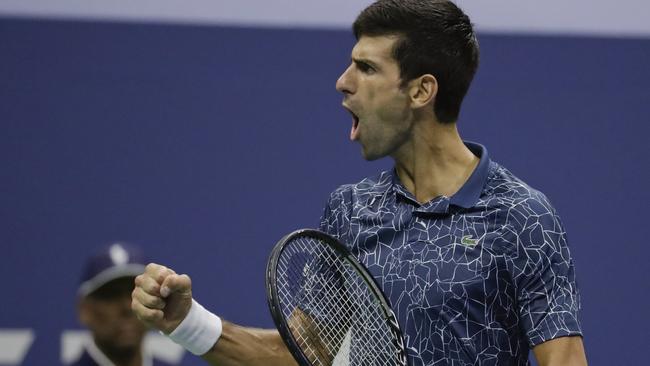 Novak Djokovic avoids an early jam on serve in the final. Picture: AP