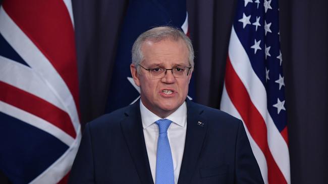 Prime Minister Scott Morrison at a joint press conference with Britain’s Prime Minister Boris Johnson and US President Joe Biden on September 16, 2021. (AAP Image/Mick Tsikas) NO ARCHIVING