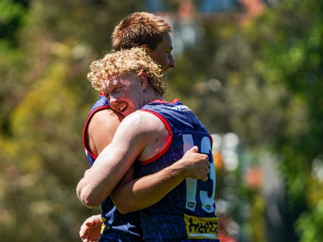 Clayton Oliver and Will Verrall at Melbourne training on Friday. Picture: David McPherson