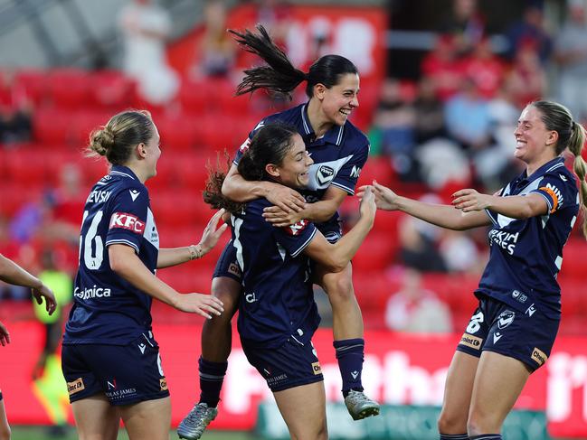 ADELAIDE, AUSTRALIA - MAY 04: Claudia Bunge of Melbourne Victory celebrates her second goal with Alex Chidiac of Melbourne Victory  and team mates during the First Leg of the A-League Women's Semi Final between Adelaide United and Melbourne Victory at Coopers Stadium, on May 04, 2025, in Adelaide, Australia. (Photo by Sarah Reed/Getty Images)