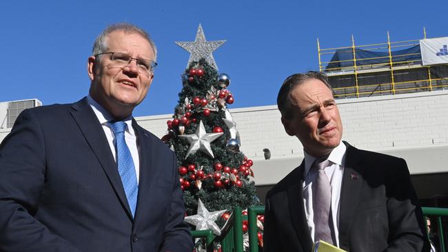 Scott Morrison and Health Minister Greg Hunt in Sydney’s Drummoyne on Friday. Picture: Jeremy Piper