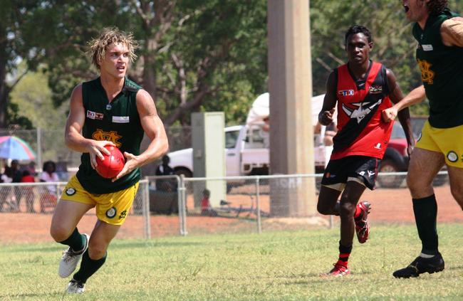 Cameron Ilett looks for a teammate while playing for St Mary’s. But he couldn’t get a guernsey on Grey Morris’s top Territory sports stars of all time list.