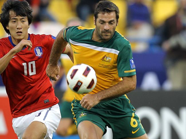 Sasa Ognenovski in action for the Socceroos at the 2011 Asian Cup. Picture: AFP  