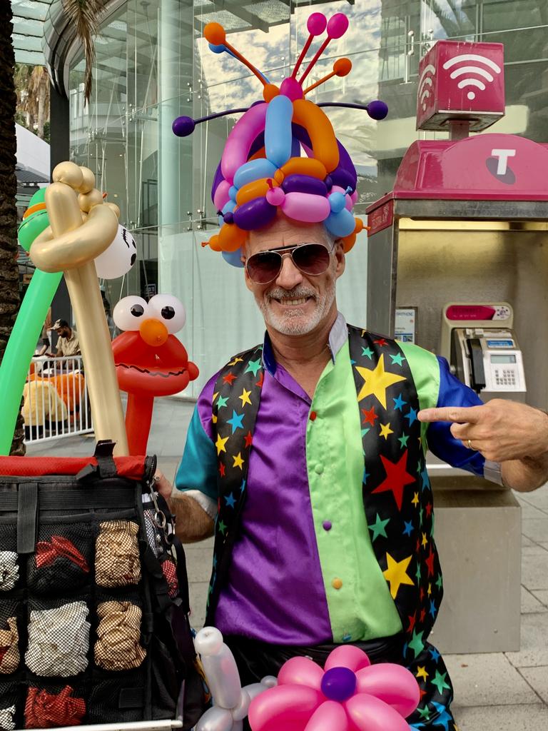 Pete the Balloon Man entertaining all in Cavill Avenue, Surfers Paradise. Picture: JENNY MASTERS