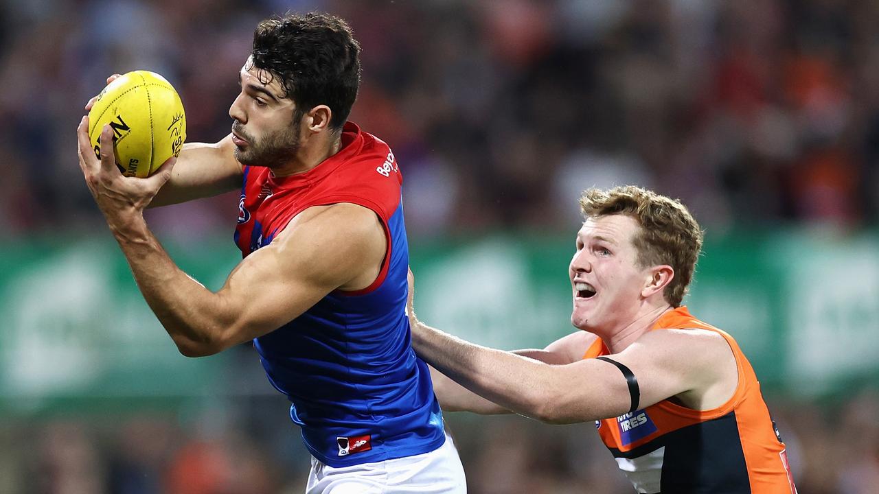 Christian Petracca of the Demons marks during the round 3 AFL match between the GWS Giants and the Melbourne Demons at Manuka Oval. (Photo by Cameron Spencer/Getty Images)