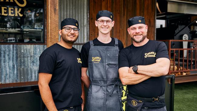 Atul Kunar, James Osler and Kenton Campbell at the new Sugar Creek Smokehouse at the Distillery Road Market, Eagleby