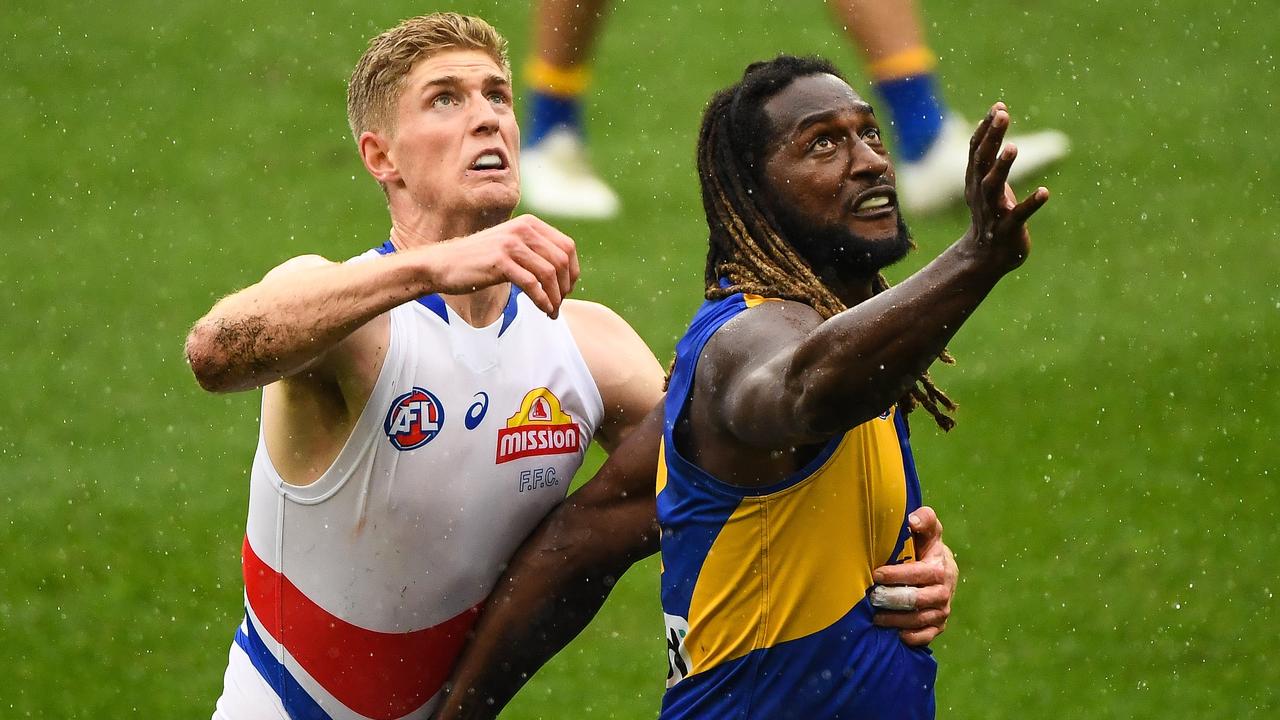 Tim English of the Bulldogs and Nic Naitanui of the Eagles Picture: Daniel Carson