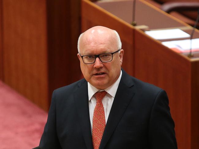 Attorney General Senator George Brandis speaking in the Senate Chamber, at Parliament House in Canberra. Picture Kym Smith