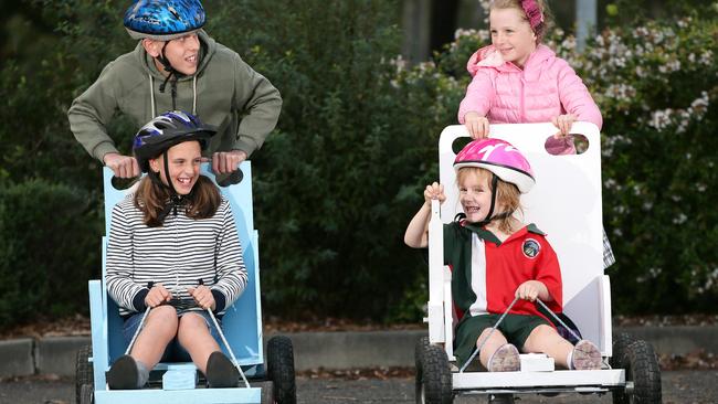 Alec and Tzara Sheaves of The Ponds take on Abigail and Amelia Barber of Kellyville in a practice run for the Rouse Hill Billy Cart Derby. Pictures: Justin Sanson