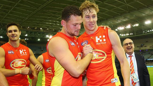 Gold Coast co-captains Steven May and Tom Lynch.