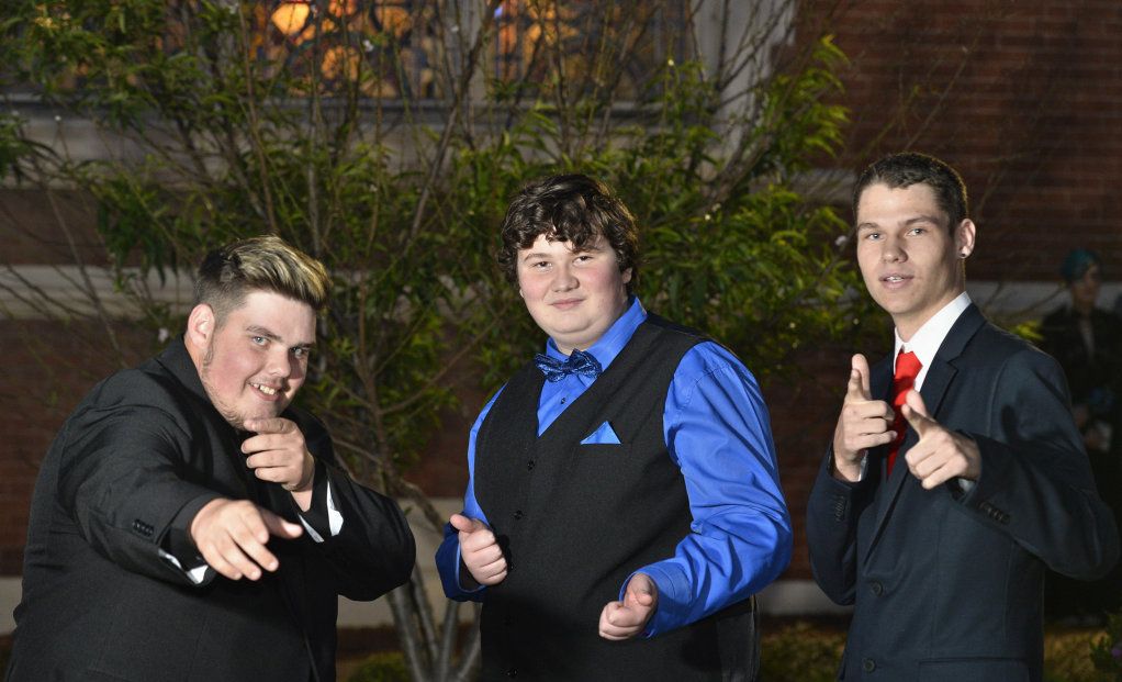 Toowoomba Flexi School graduates (from left) Jayken Vaughan, Michael Williams and Ashley Windus attend their formal at Empire Theatres, Thursday, November 9, 2017. Picture: Kevin Farmer