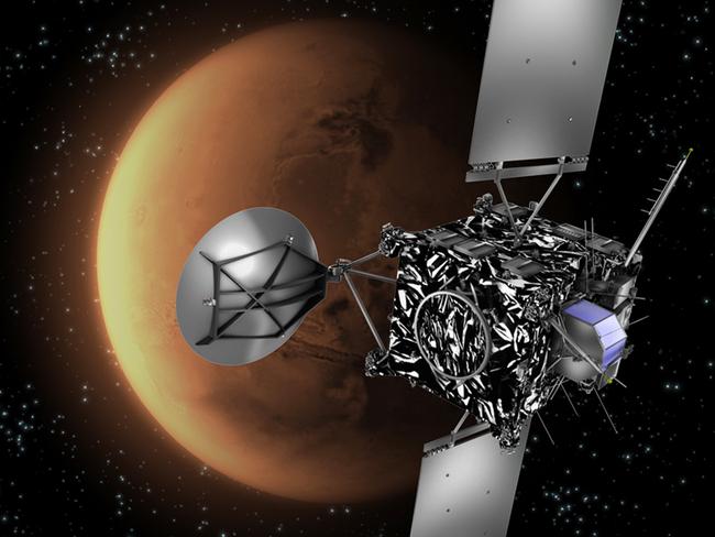 An artist’s impression of the Rosetta with Mars in the background. The spacecraft used Martian gravity to correct its orbit in what is one of the longest and costliest exercises in space history. Picture: AFP