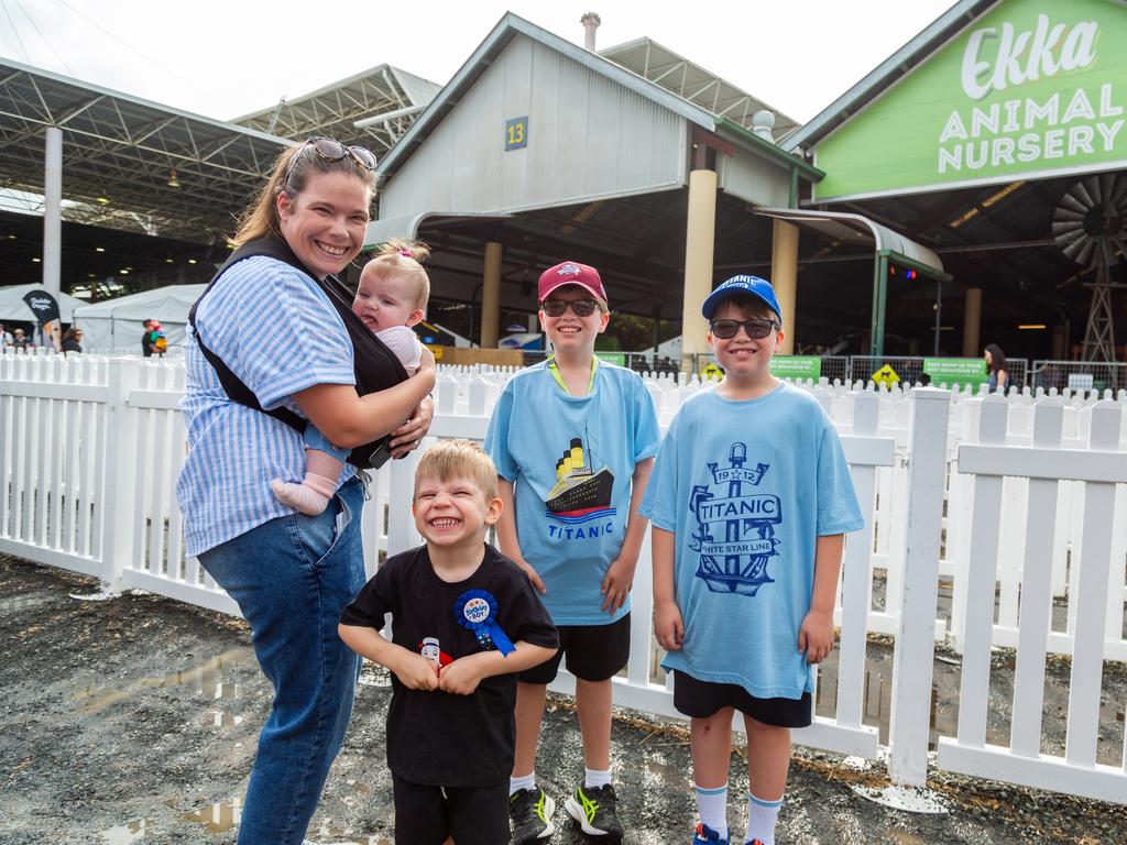 51 pics: Ekka-goers brave big wet on day 3 | The Courier Mail