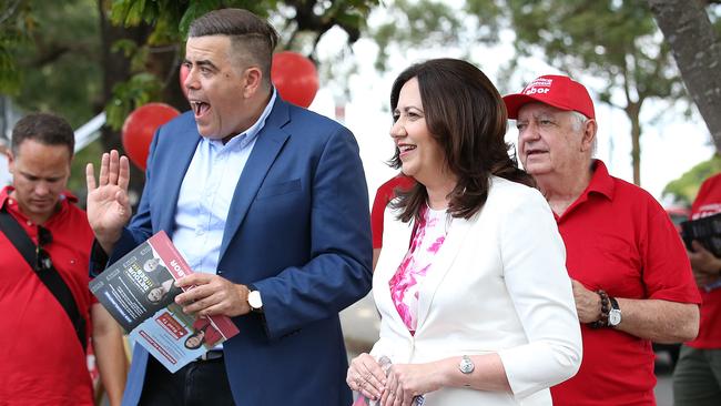 Queensland Premier Annastacia Palaszczuk arrives to vote at her electorate in Inala, with father Henry (R) and Federal Member for Oxley Milton Dick. Picture: Getty Images