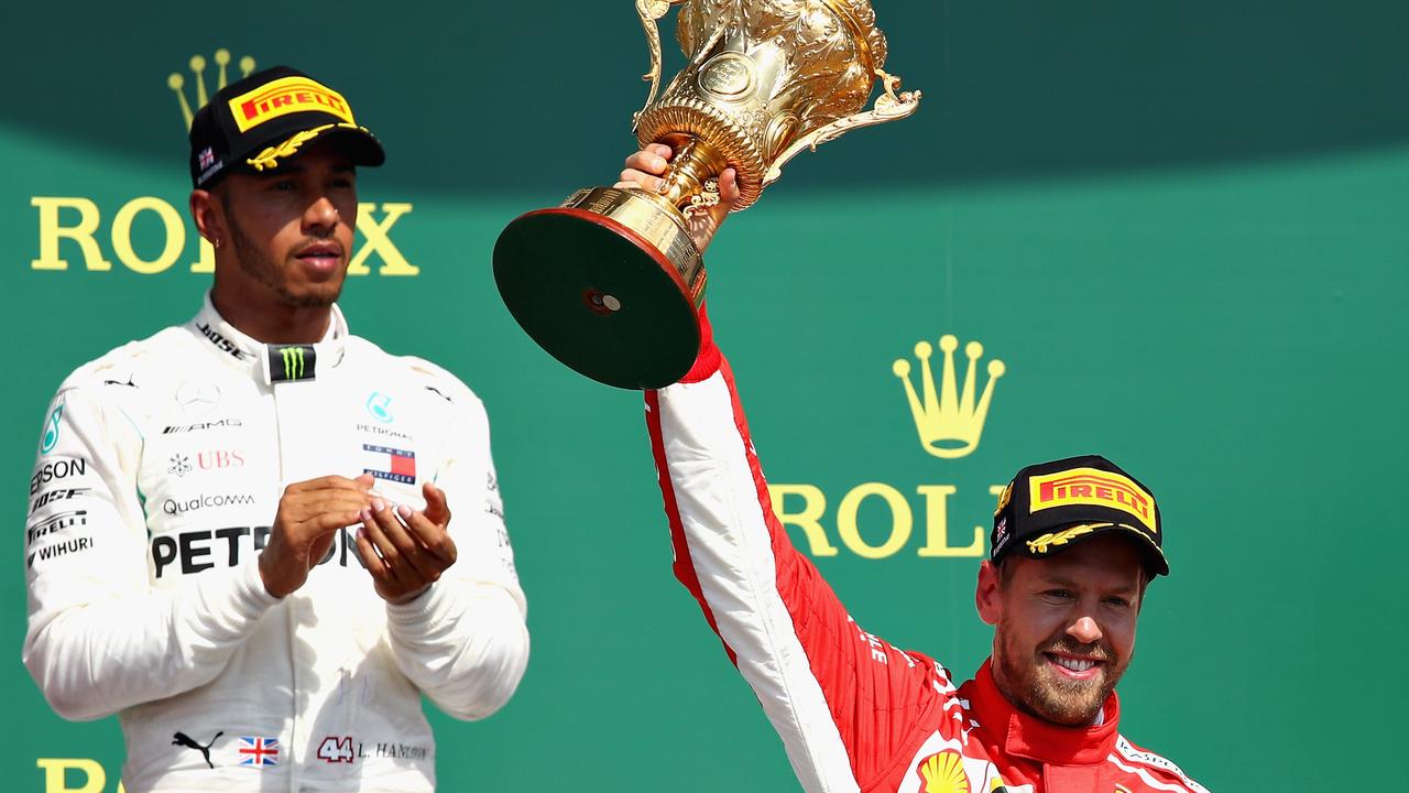 Winner Mercedes' British driver Lewis Hamilton with the trophy on the  News Photo - Getty Images