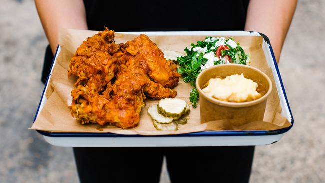 The fried chicken wings with potato and gravy and kale salad. Photo: Alana Dimou.